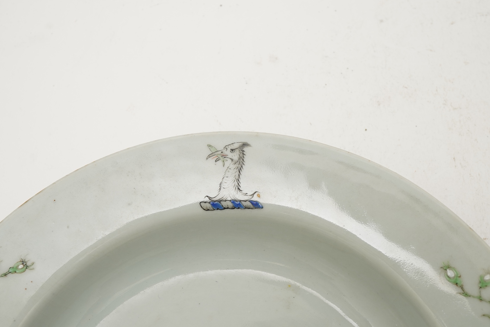A pair of Chinese famille armorial plates, Qianlong, c.1750